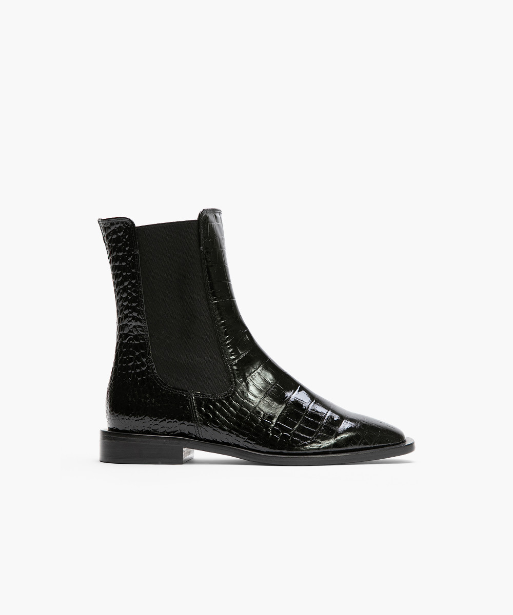 Black embossed patent leather Chelsea boots